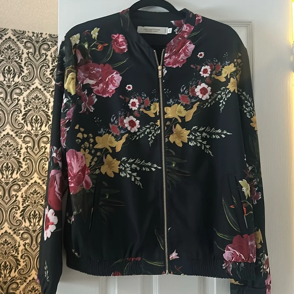 floral jacket with gold, zipper, and elastic sized waistband. - Picture 1 of 4